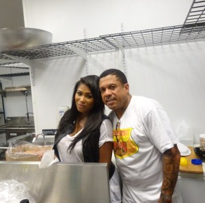 Althea coming to show some support to her hubby in the kitchen